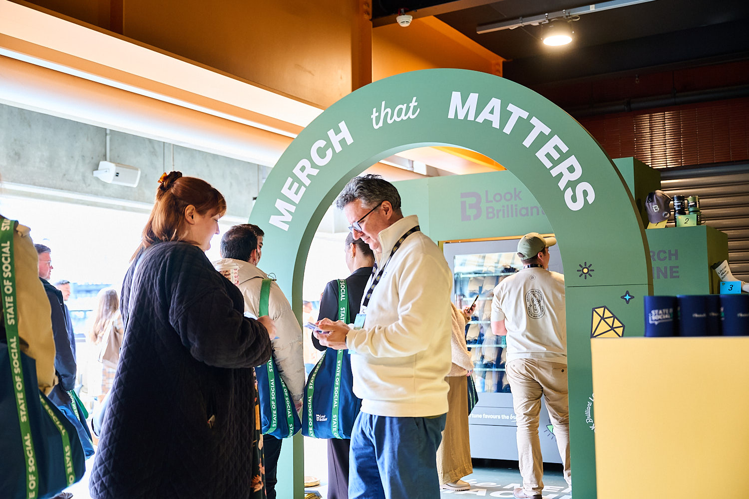 Delegates at the Merch that Matters arch