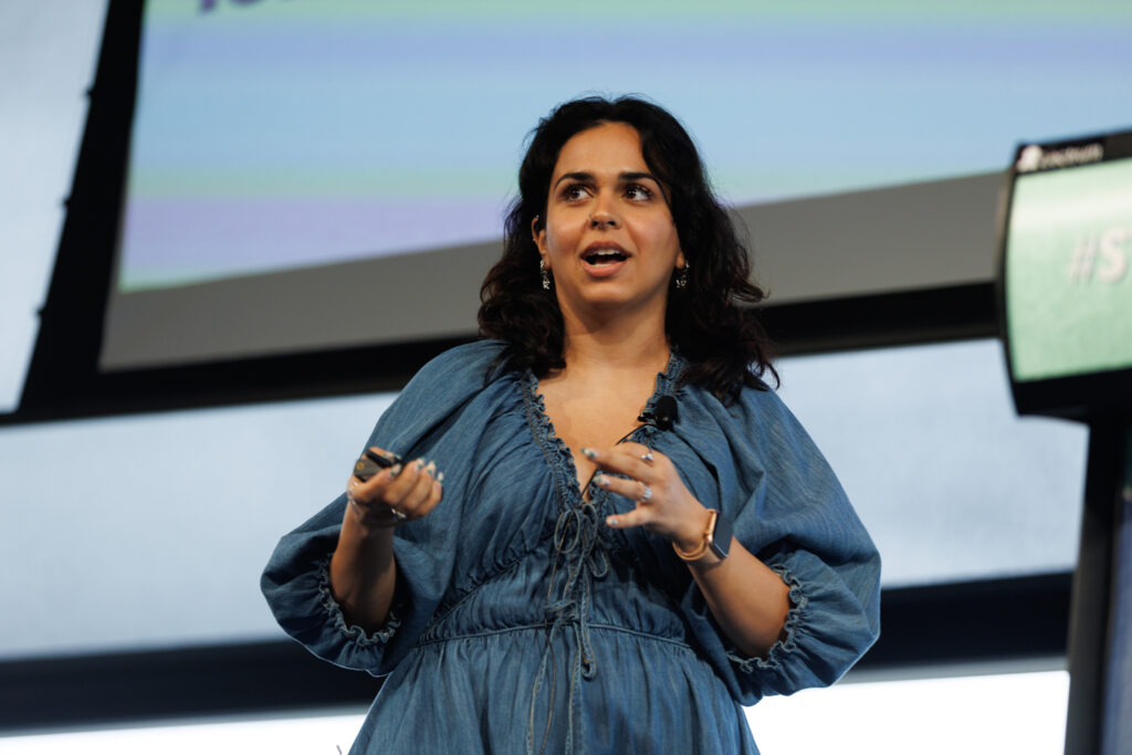 A speaker mid-session on the SOS26 stage