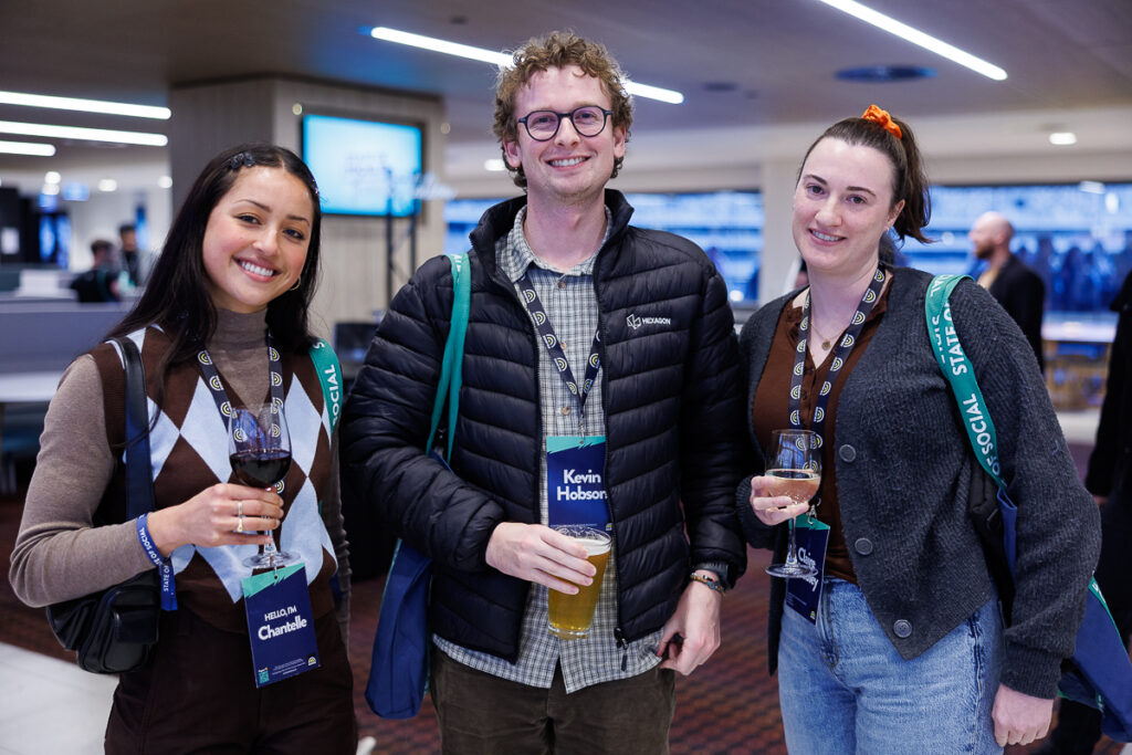 Delegates smiling between sessions at SOS26